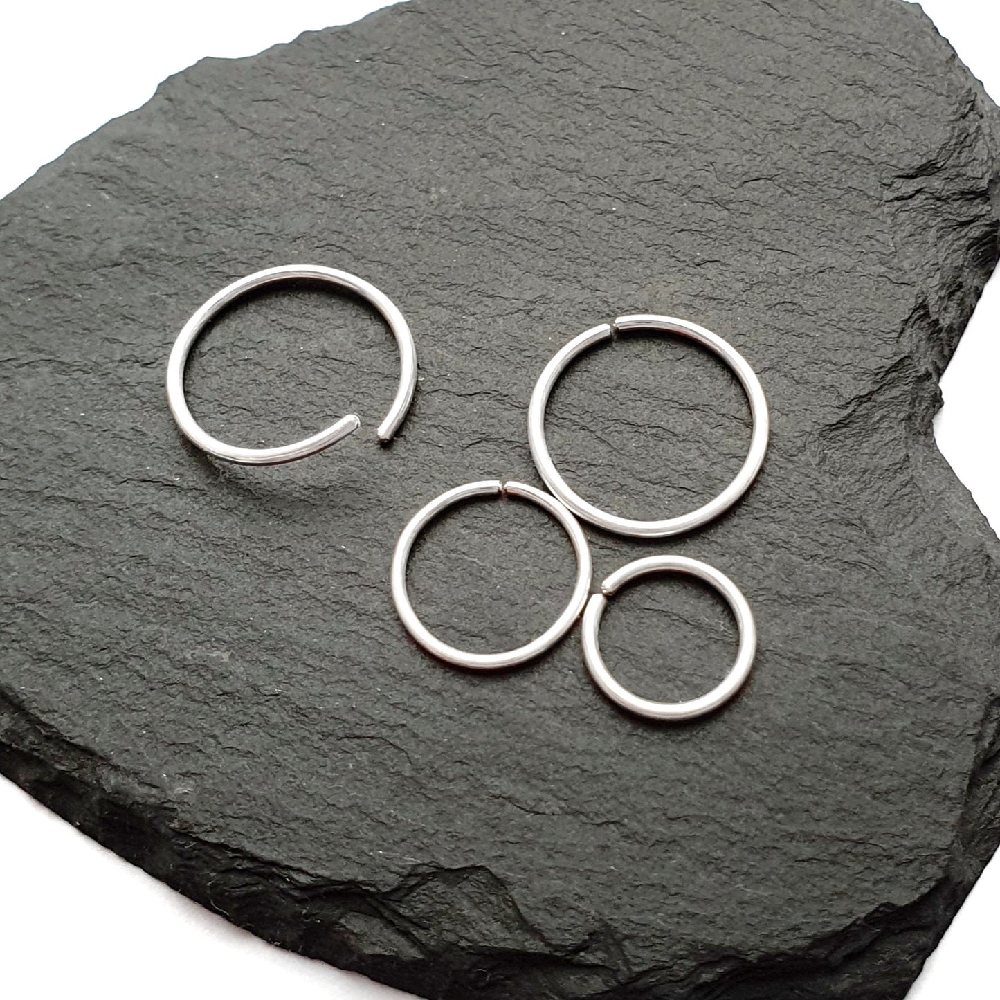 20g silver seamless hoop nose piercing